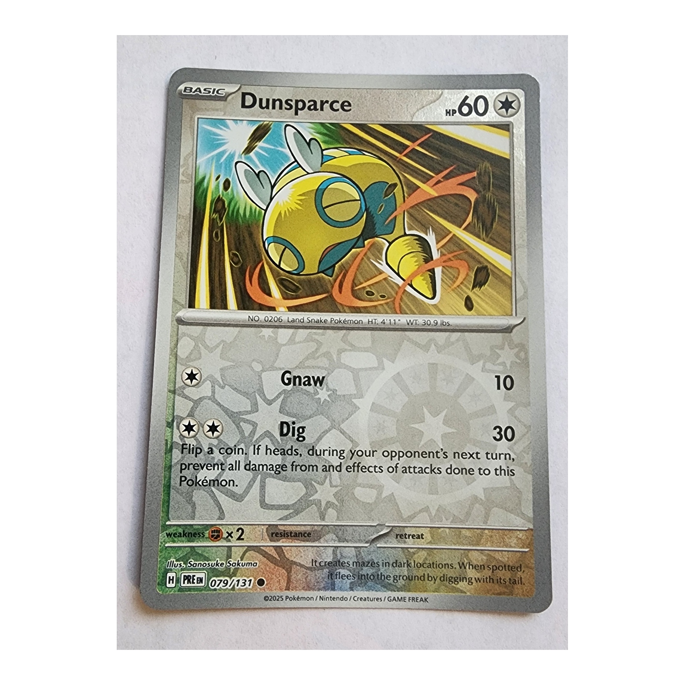 Dunsparce Common SV08.5: Prismatic Evolutions 079/131 NM Reverse Holo