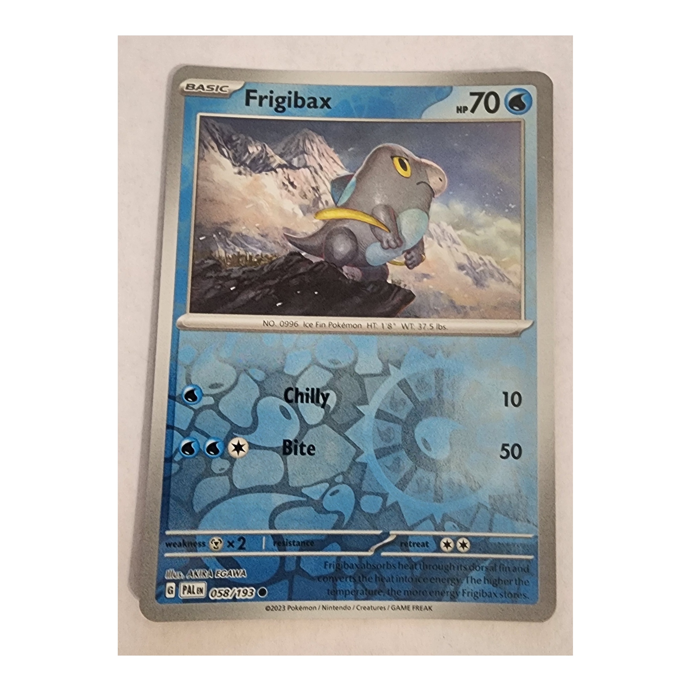 Frigibax Common SV02: Paldea Evolved 058/193 NM Reverse Holo