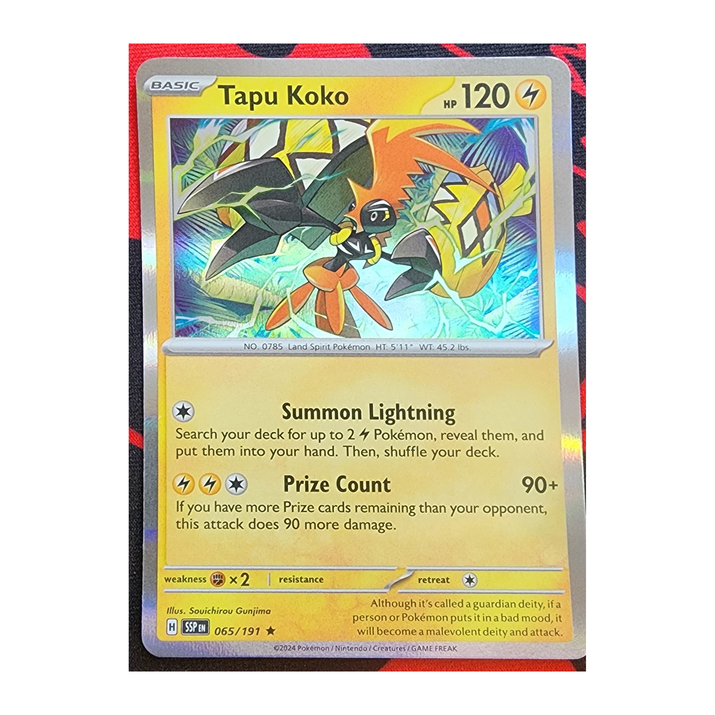 Tapu Koko Rare SV08: Surging Sparks 065/191 NM Holo
