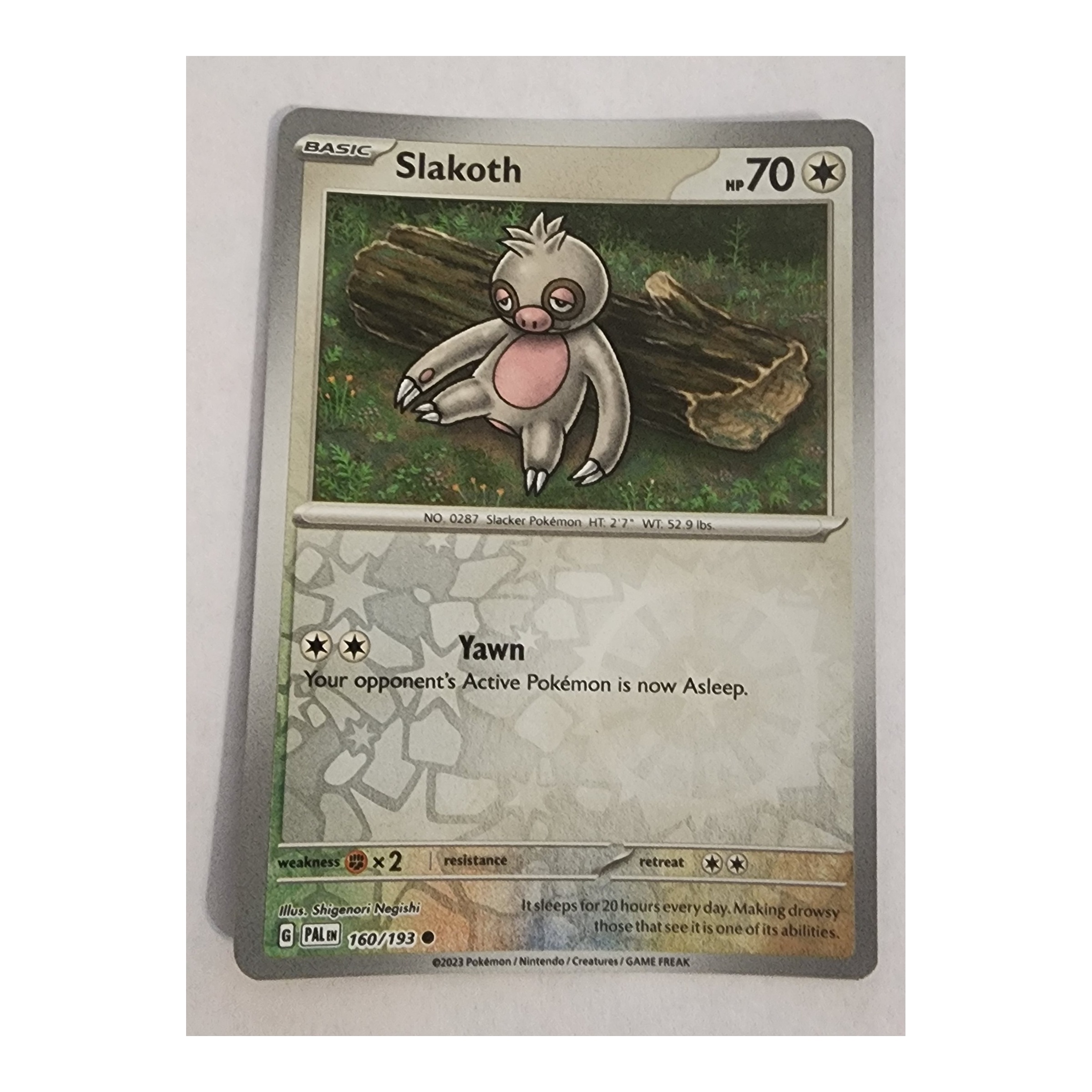 Slakoth Common SV02: Paldea Evolved 160/193 NM Reverse Holo